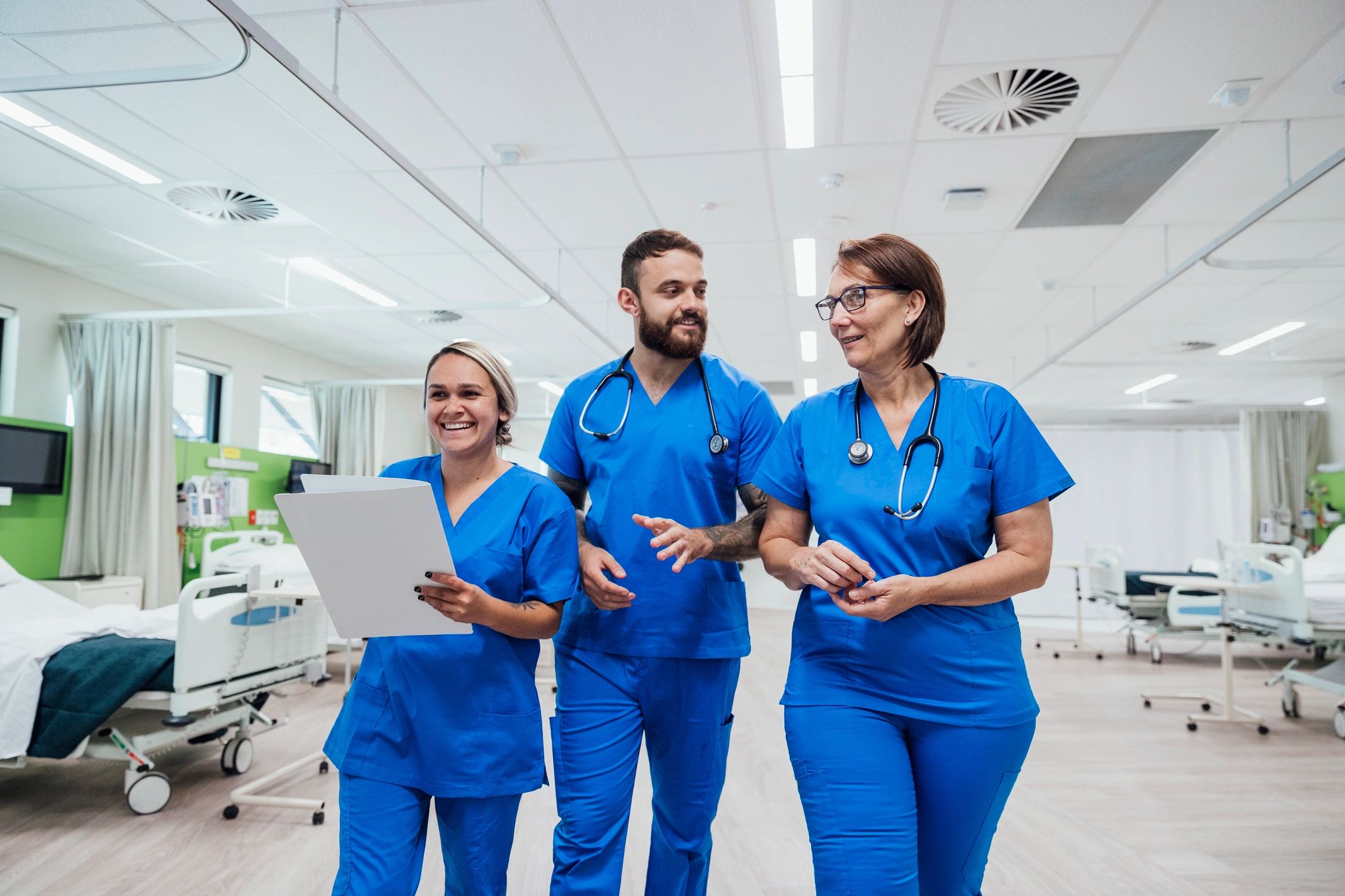 Healthcare workers walking together in a hospital