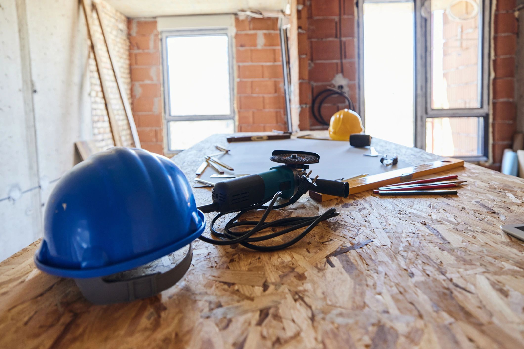 Construction tools and equipment arranged on a job site