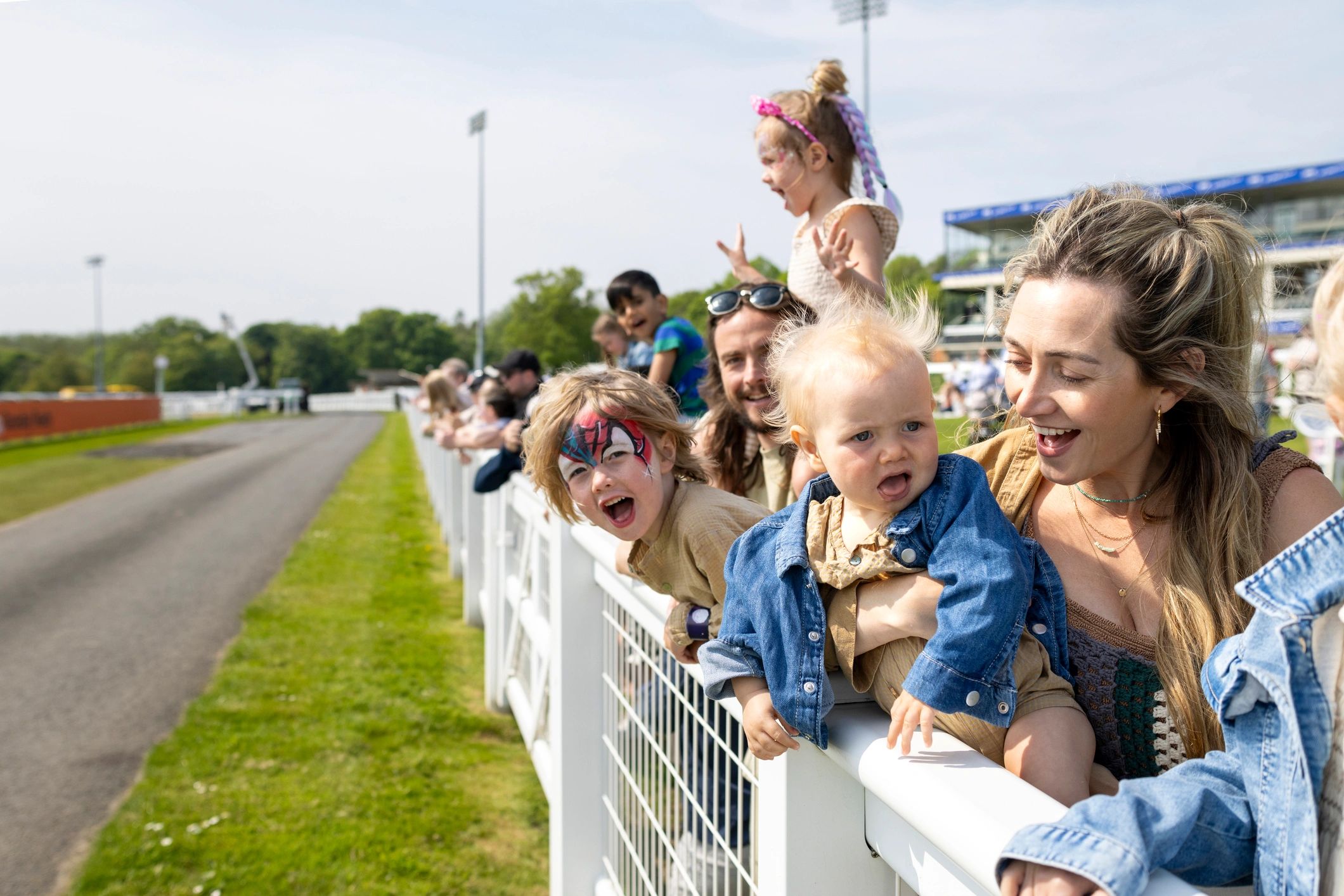 Families watching an event together
