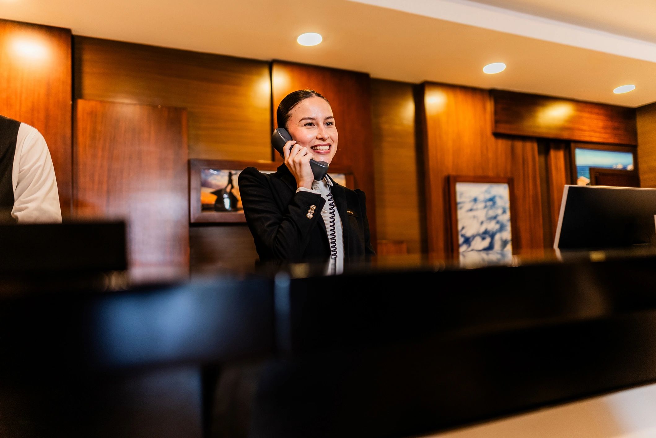 Reception-style professional at a front desk